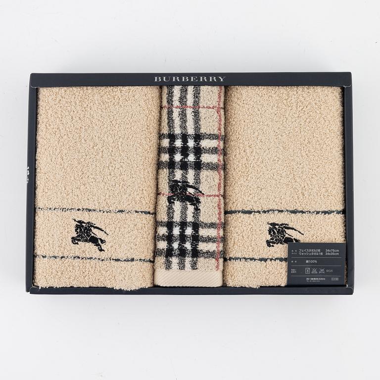 Burberry, a set of three towels.