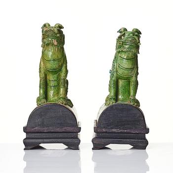 A pair of green glazed roof tiles, Ming dynasty (1368-1644).