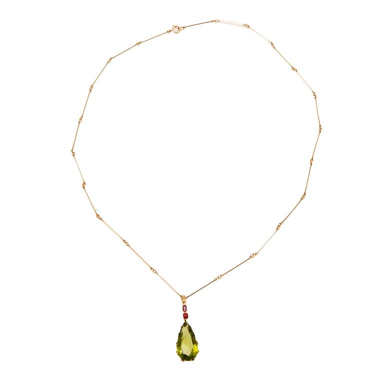 Ateljé Stigbert, necklace in 18K gold with a pear-shaped peridot and faceted rubies, Heribert Engelbert Stockholm 1948.