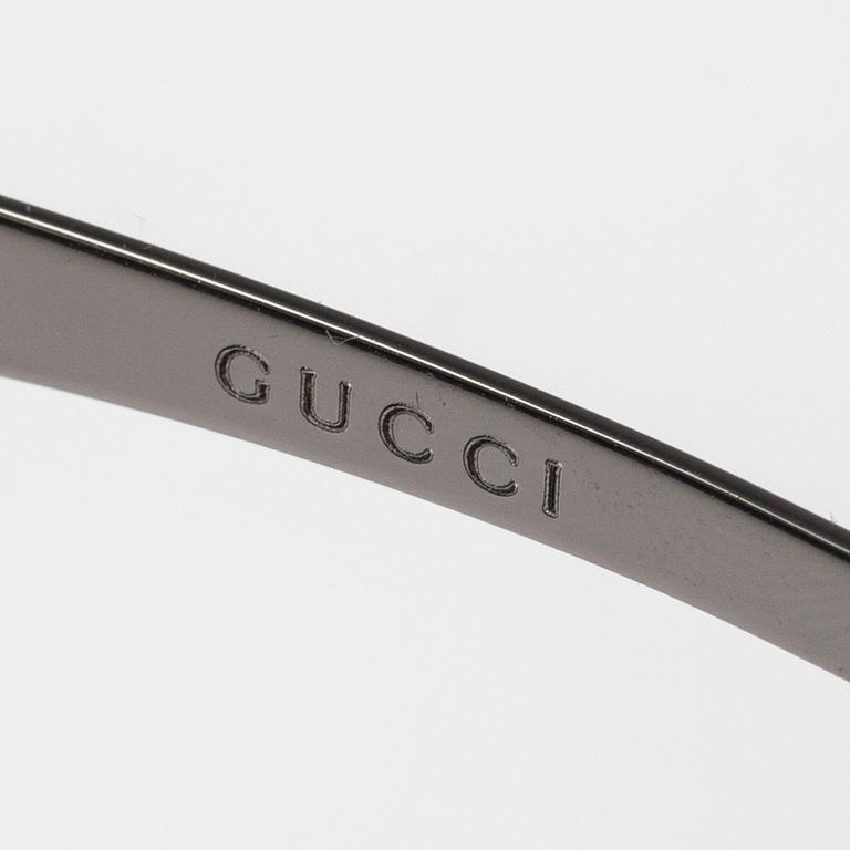 SOLGLASÖGON, Gucci.