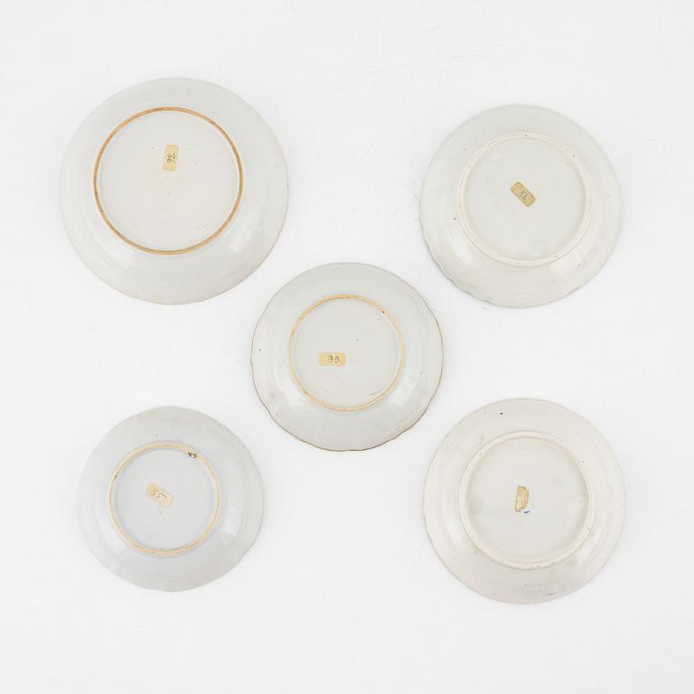 Two Chinese blue and white cups with saucers, a bowl and a dish, Qing dynasty, Jiaqing (1796-1820).