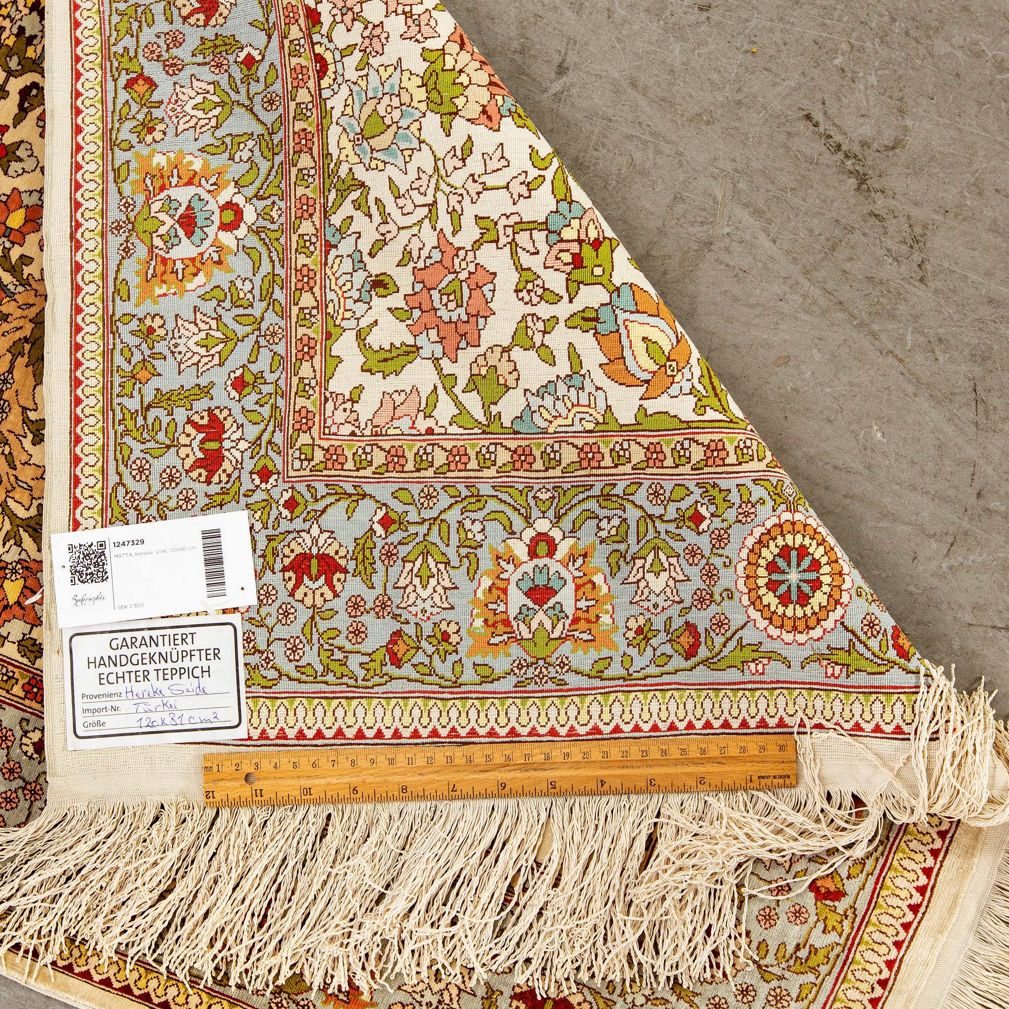A silk Hereke rug. 120x80 cm.