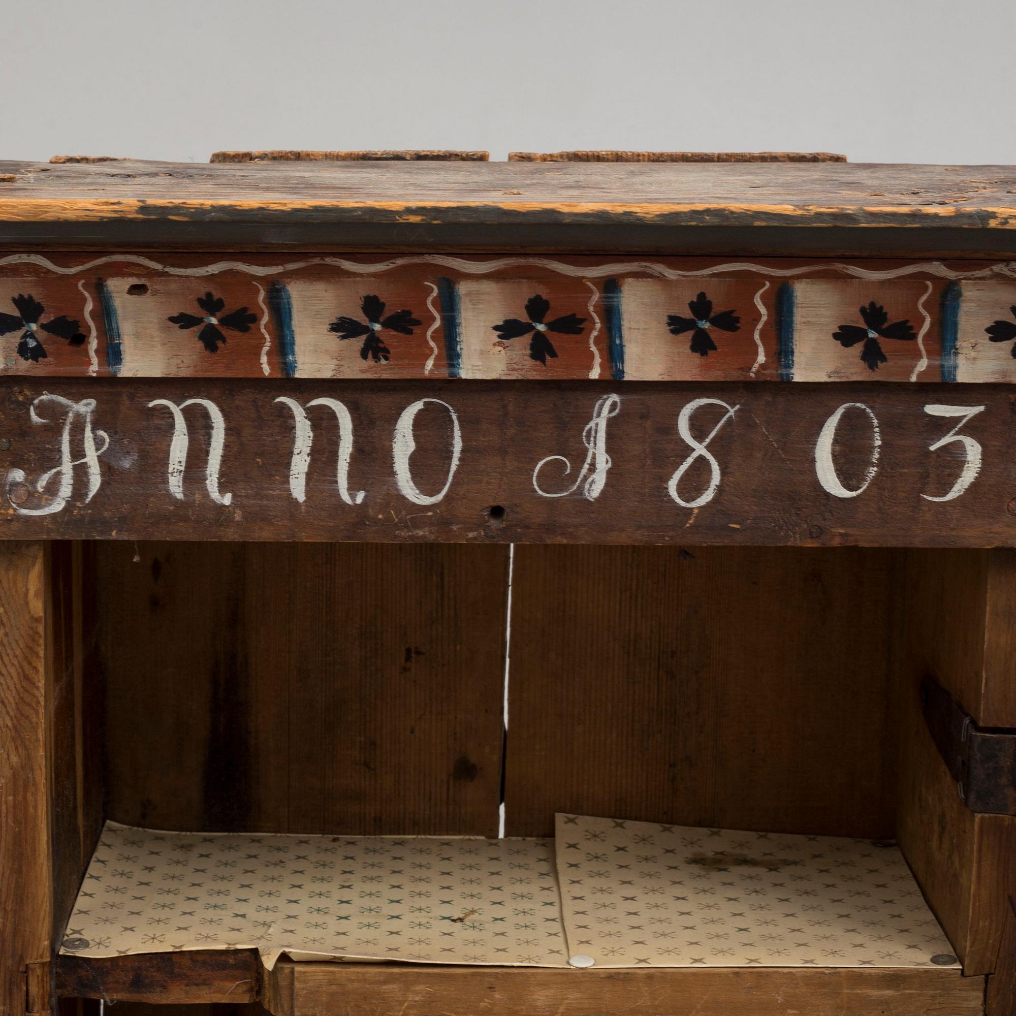 An early 19th century wall cabinet.