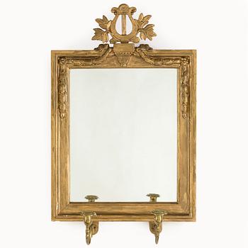 A Gustavian late 18th century mirror sconce.