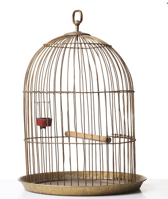 Firma Svenskt Tenn, a brass coloured metal birdcage, first half of 20th century, provenance Estrid Ericson.