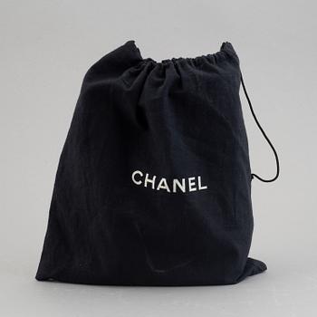 A Chanel "Flap Bag".
