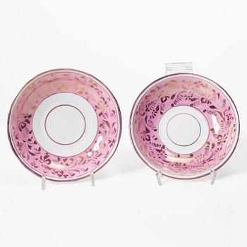 Twelve cups and saucers, England, 19th century.