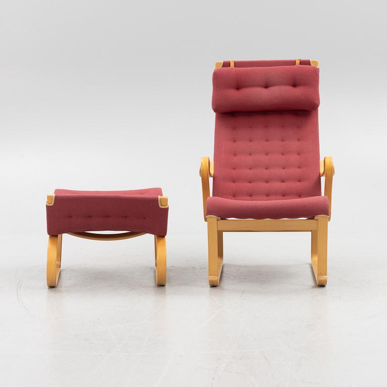 Bruno Mathsson, a 'Migo' armchair with a foot stool, Mathsson International, Värnamo.