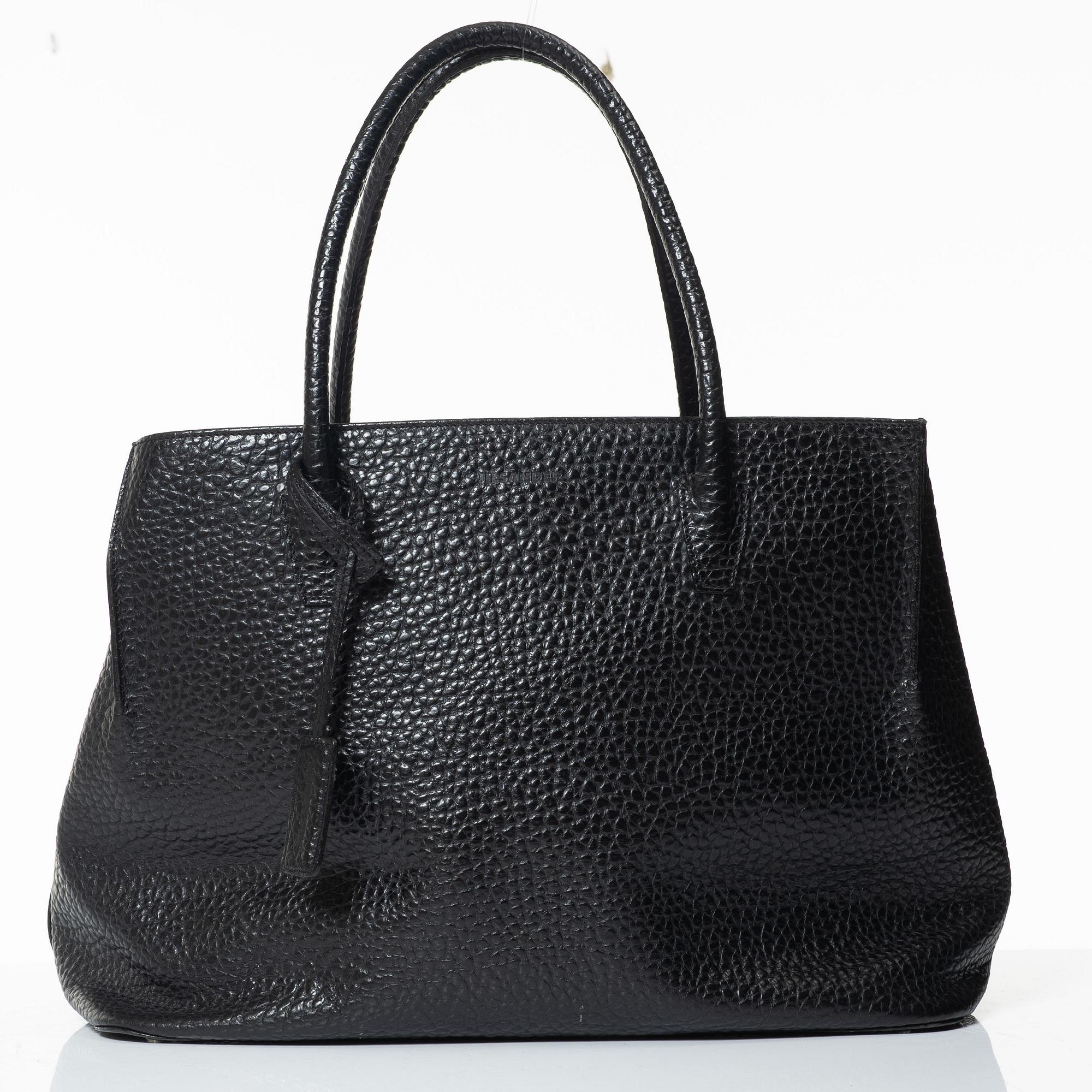 Jil Sander, A black leather bag.
