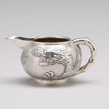 A Chinese four piece silver tea set, Luen Wo, Shanghai, 1875-1925.