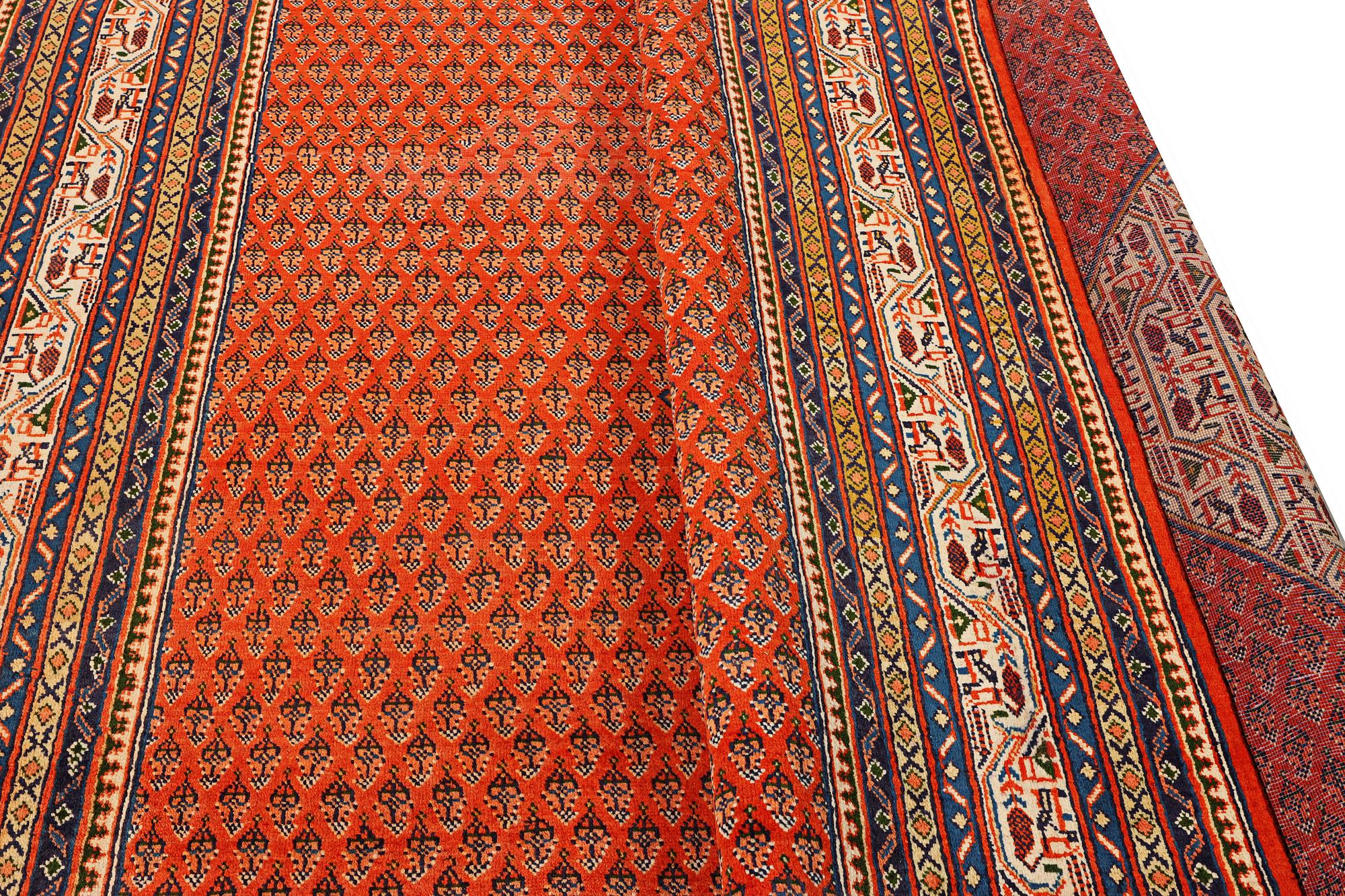 A Boteh Mir carpet, c. 346 x 242 cm.