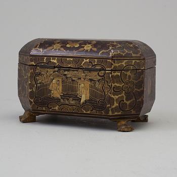 A Chinese Export Lacquerware Tea Caddy with Pewter Fitted Interior, 19th Century.