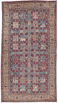 326. A CARPET, a semi-antique Kerman, ca 591,5-593 x 324-327 cm.