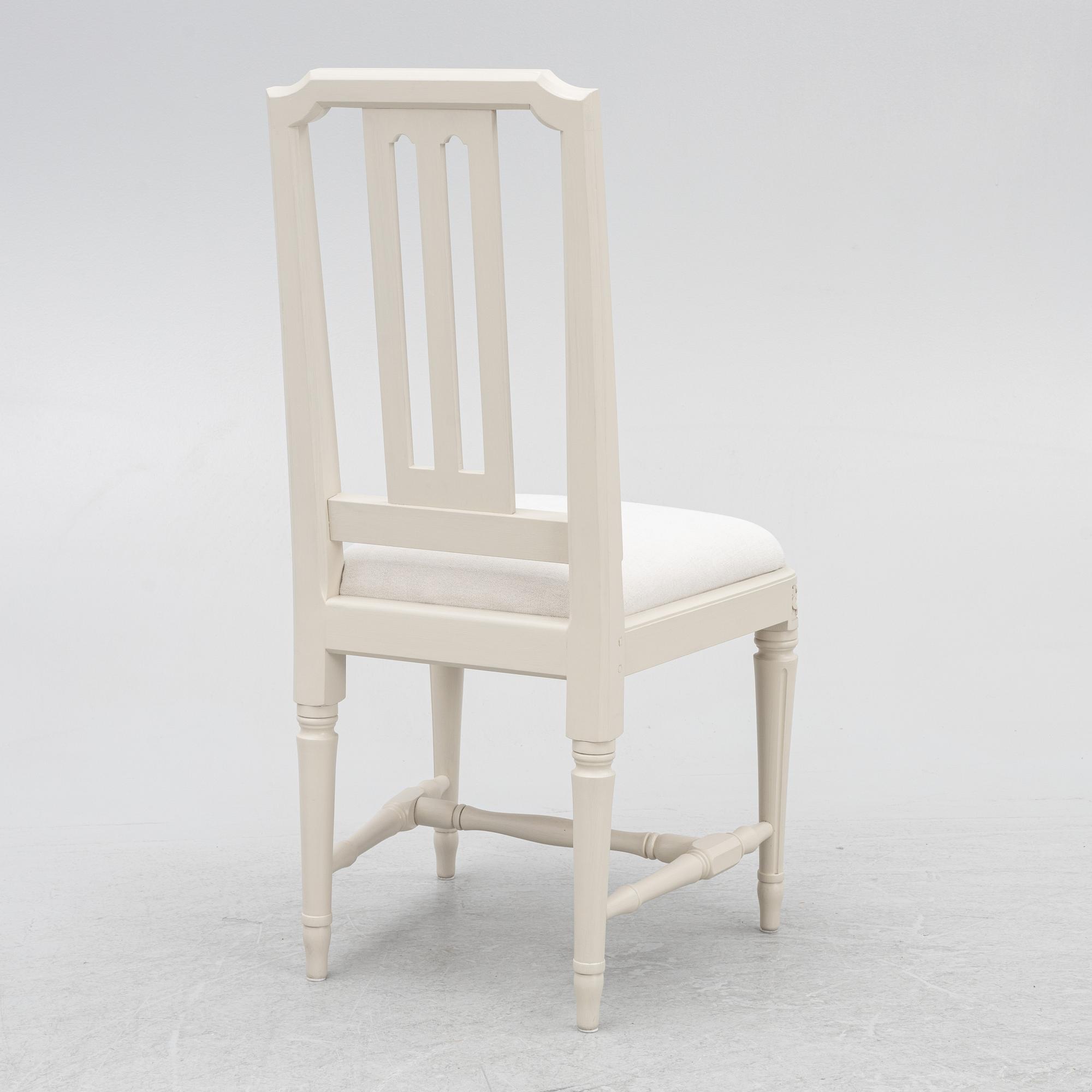 A late 19th century desk and an "Odenslunda" chair from IKEAs 18th century series.