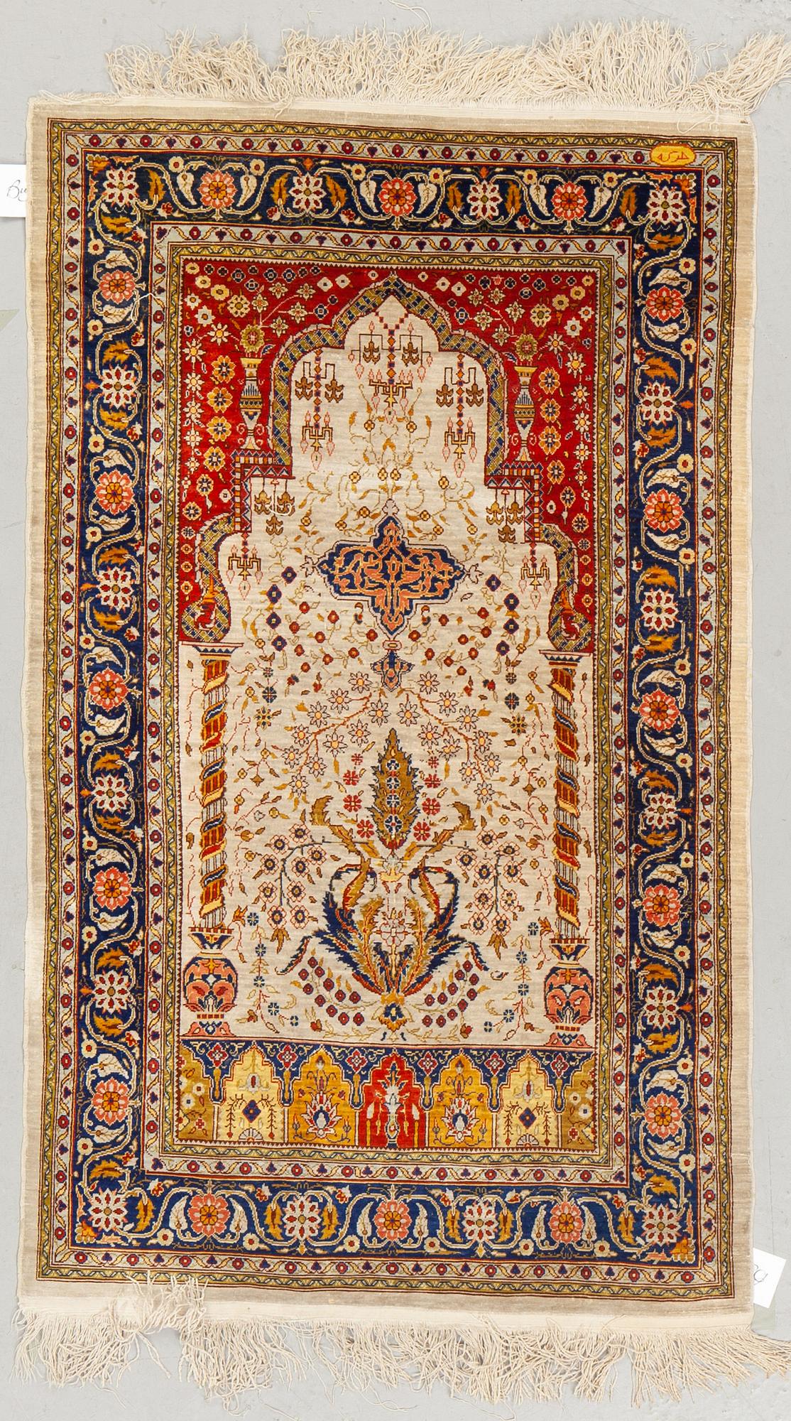 A rug, old Hereke, silke, ca 119 x 71 cm.