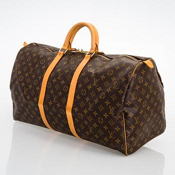 LOUIS VUITTON BLACK EPI LEATHER KEEPALL 55 TRAVEL BAG. - Bukowskis