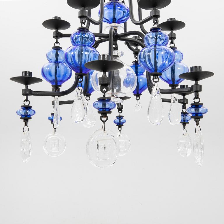 Erik Höglund, a 12-candle chandelier for Boda Smide.