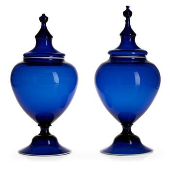 721. A pair of blue glass jars with covers, ca 1800, Gothenburg or Gjövik.