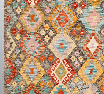 A Kilim carpet, ca 298 x 210 cm.