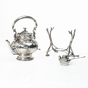 Silver teapot on a réchaud, Rococo style, Swedish import mark CF Carlman, Stockholm 1916.