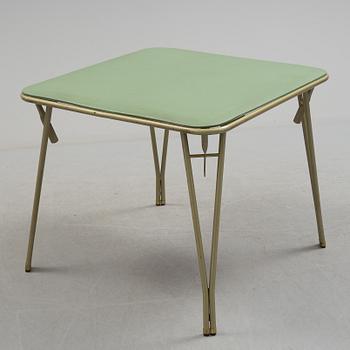 A table and four chairs by Dipetrol, second half of the 20th century.