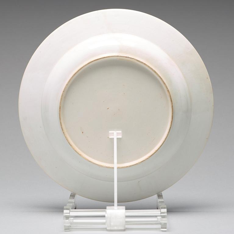 A set of eight blue and white armorial soup dishes, Qing dynasty, 18th Century.