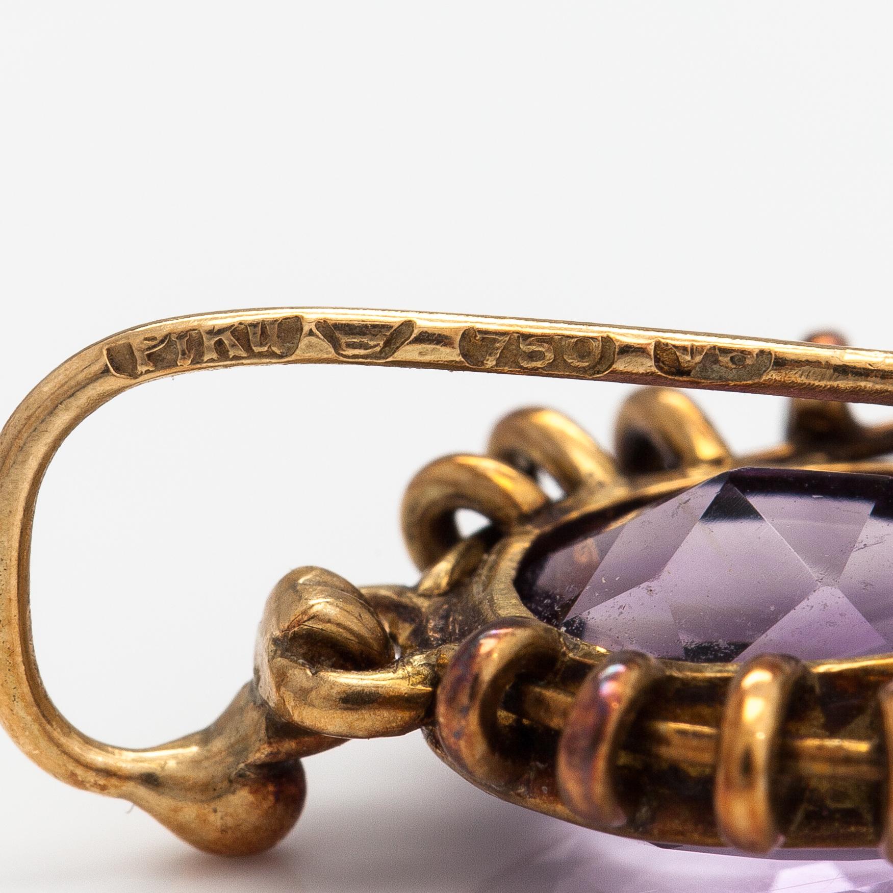 A pair of 18K gold earrings with amethyst. Pirkan kulta, Tampere 1950.
