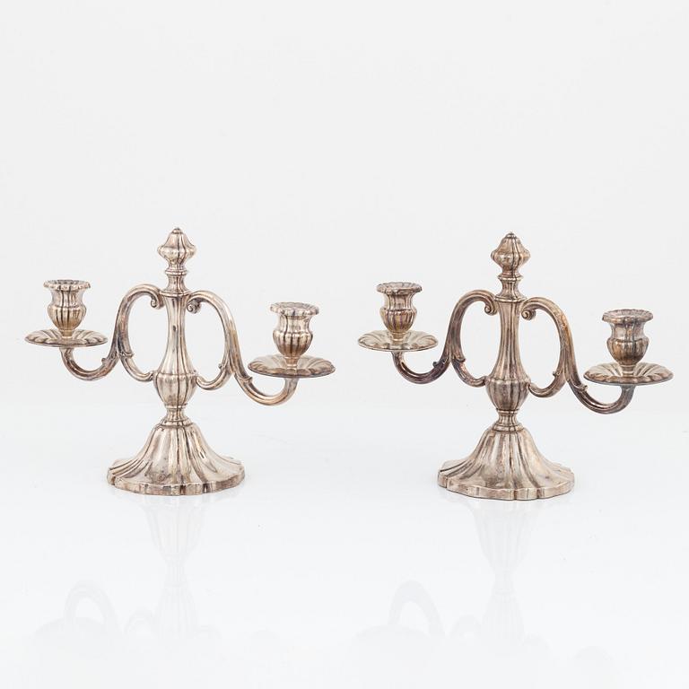 A pair of silver candelabras, swedish import mark.