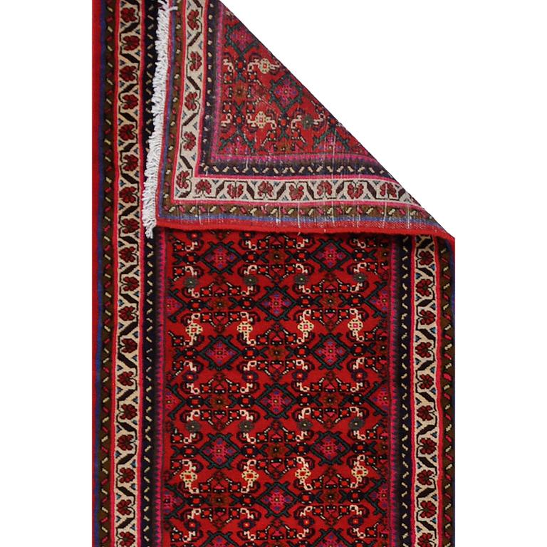A Hosenabad runner, approximately 502 x 82 cm.
