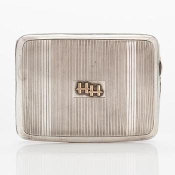 An Art deco sterling silver cigarette case, Sheffield 1929.