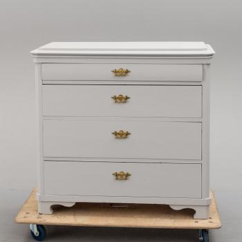 an early 20th century painted chest of drawers.