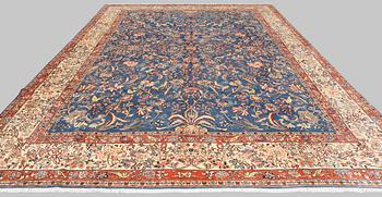 A figural Sarouk carpet, approx. 412 x 300 cm.