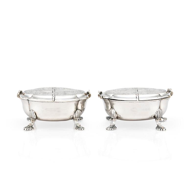 A pair of Latvian Rococo silver salt and pepper stands, marks of Johan Christian Henck (Henke), Riga 1768-80.