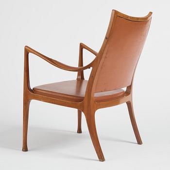 Hans Asplund, a walnut and leather easy chair, Nordiska Kompaniet, ca 1955, for the Nordiska Kompaniet beauty salon.