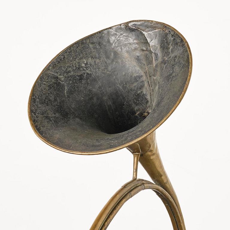 A brass hunting horn by Pierre Raoux (manufacturer of horns in Nancy, fl. ca 1723 -1789.).