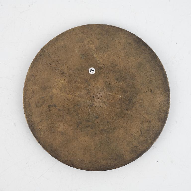 A Chinese bronze mirror, China, late Qing dynasty.