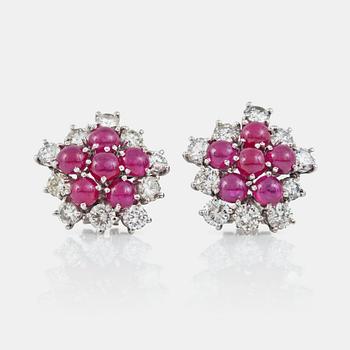 1154. A pair of ruby, ca 4.00 cts, and diamond, circa 3.20 cts, earrings.