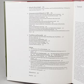 A set of 5 watch books.