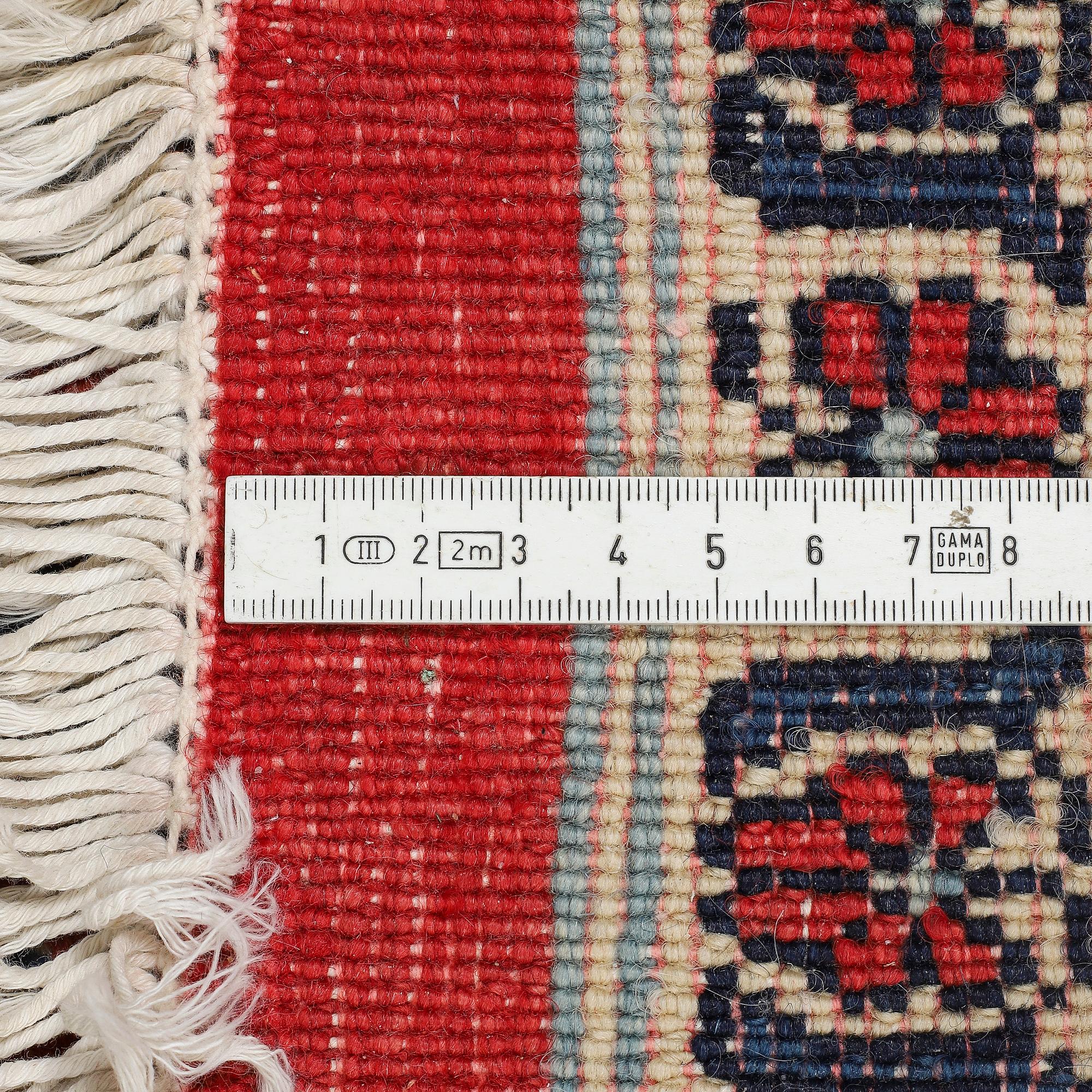 A CARPET, Old Noth west persian, ca 259 x 183 cm.