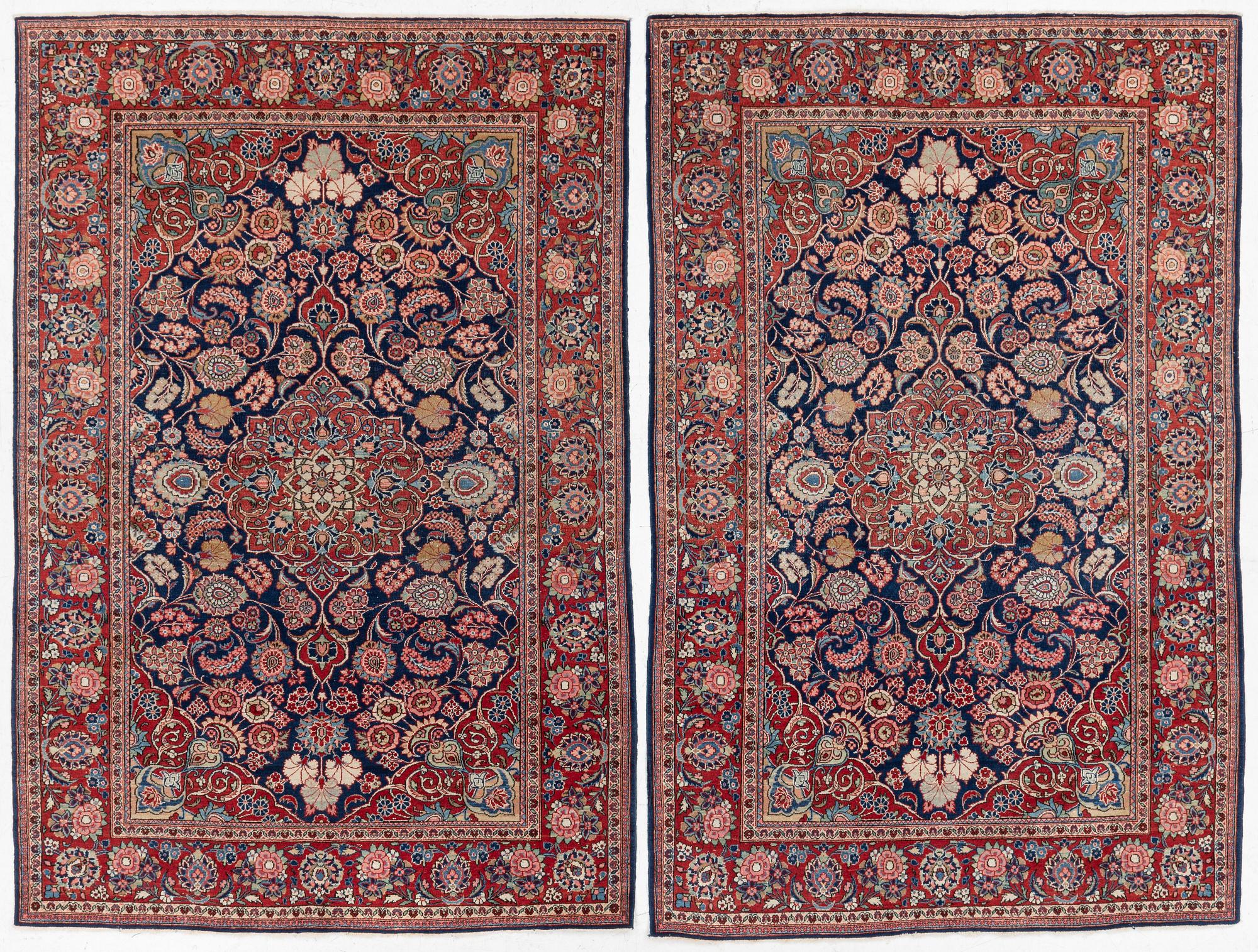 A pair of antique Keshan rugs, central persia, c. 205 x 137 cm.