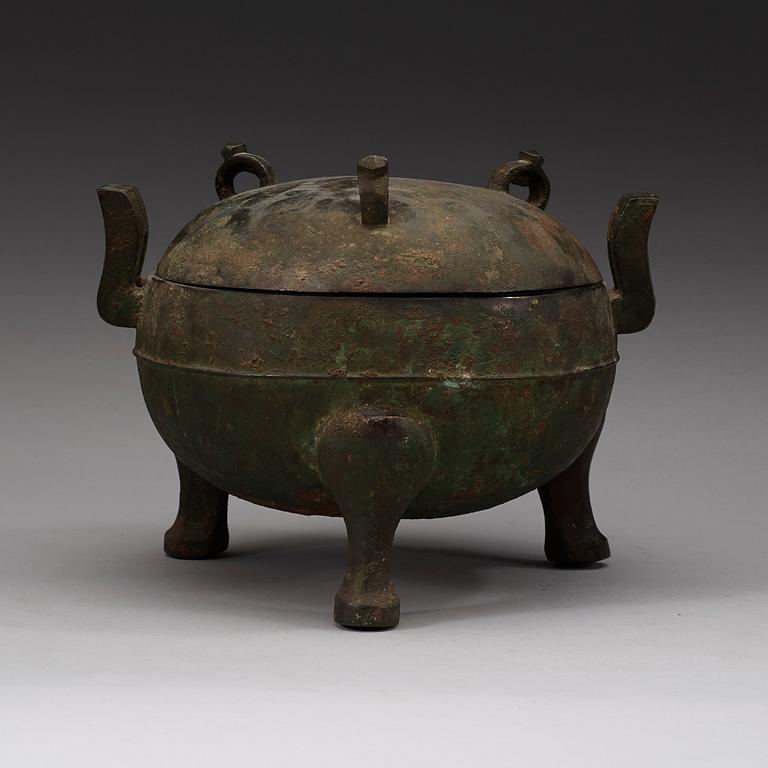 A bronze ding tripod censer with cover, presumably Han dynasty (206 BC - 220 AD).