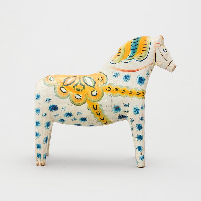 A painted folk art dala horse first half of the 20th century.