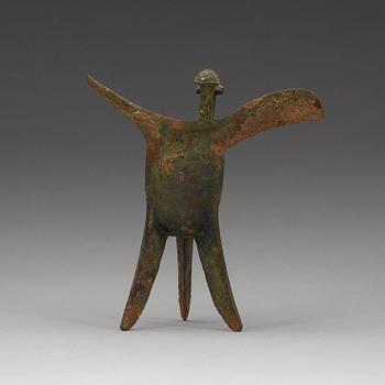 A bronze ritural tripod wine vessel 'Jue', presumably Shang dynasty, 12/11th Century BC.