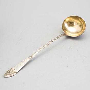 A Swedish early 20th century parcel-gilt soup-ladle, marked CGH, Stockholm 1907.