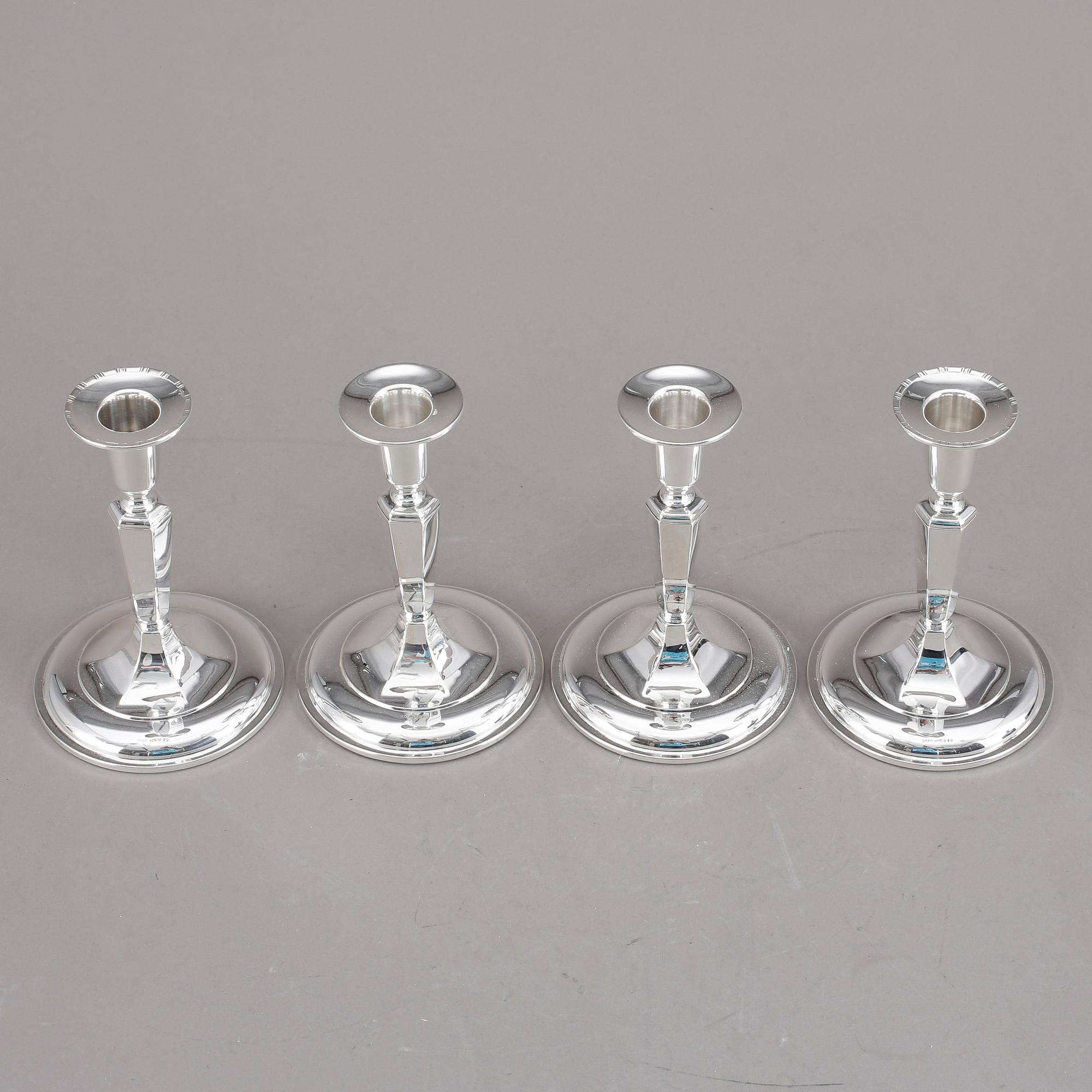 LJUSSTAKAR, 4st snarlika, silver, K&EC, Göteborg, 1956.