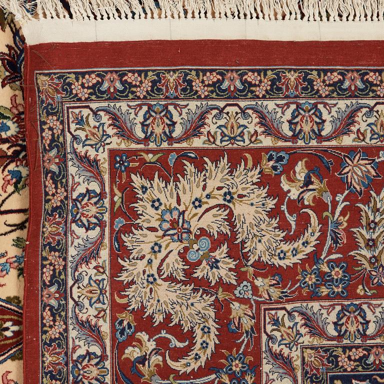 A CARPET. An old Esfahan Nazeri nedjad. 240,5 x 157,5 cm (as well as one end with one cm flat weave,