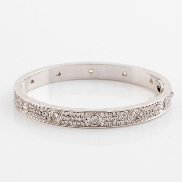 A Cartier "Love" bracelet in 18K white gold set with round brilliant-cut diamonds.