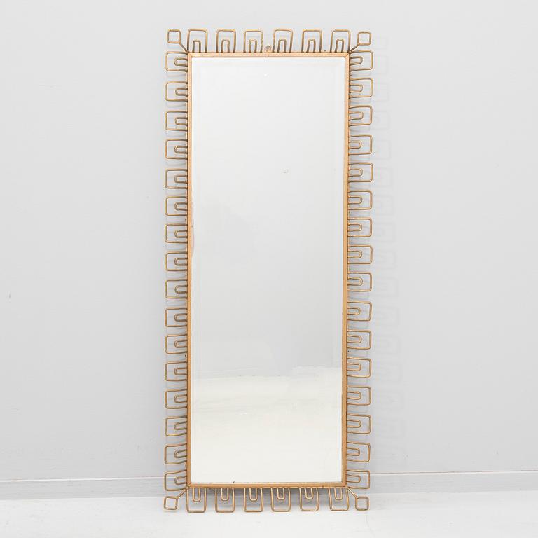 A 1940s Swedish Modern mirror.