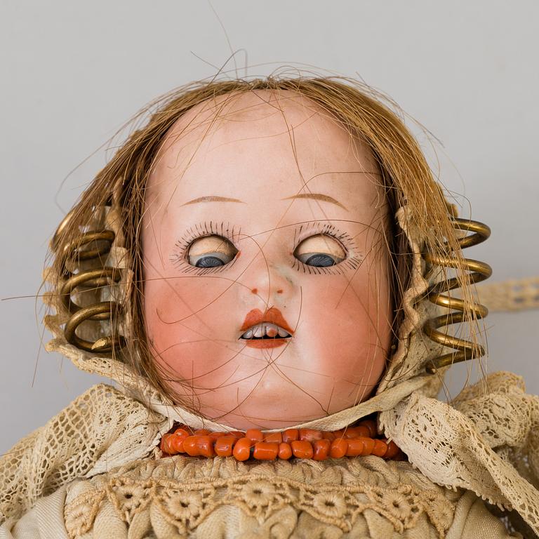 a HEUBACH KÖPPELSDORF porcelain doll, Germany in the first half of the 20th century.