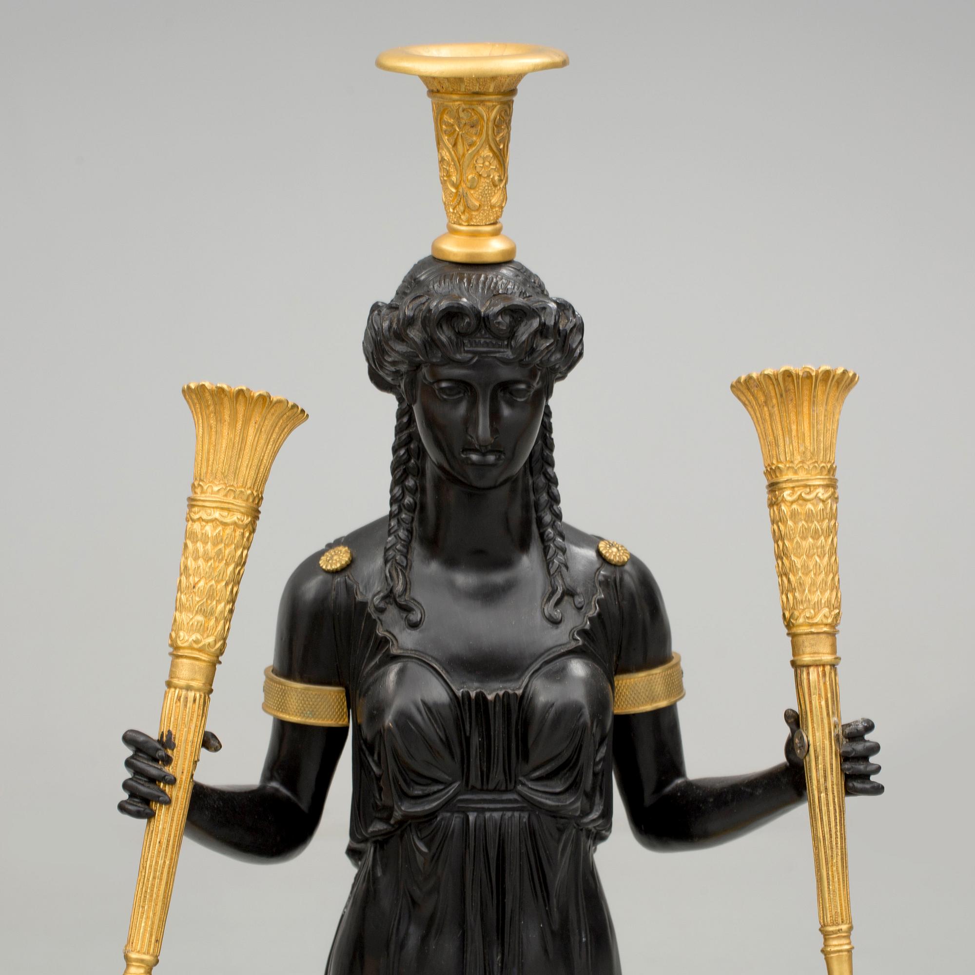 KANDELABRAR, ett par, för tre ljus, empirestil, 1900-tal.